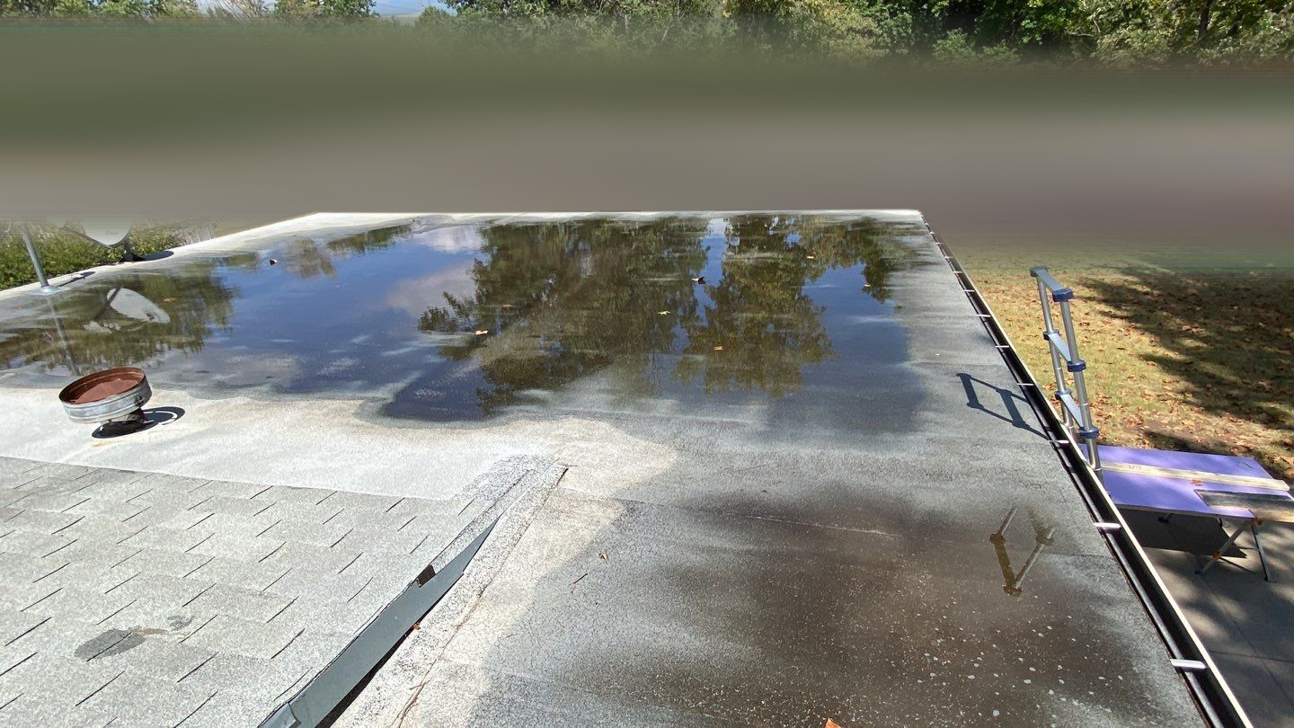 Residential Flat Roof Ponding - Rhoden Roofing