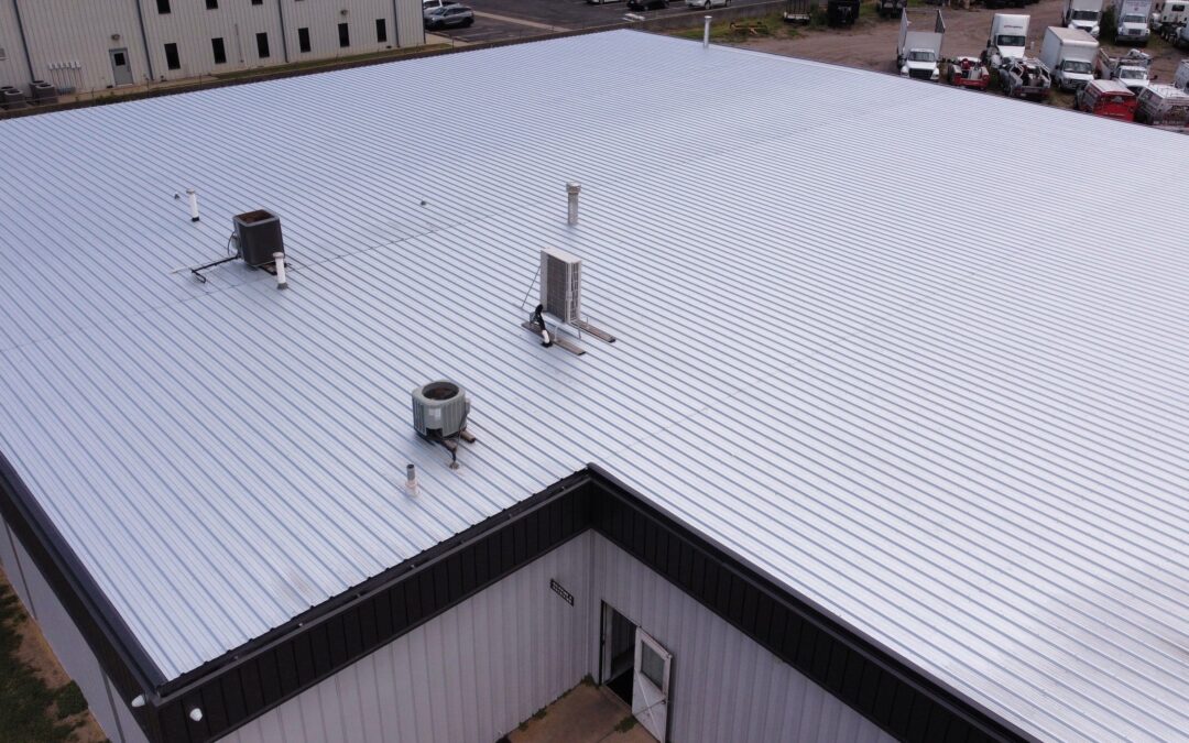 Retrofit vs. Replacement: What’s the Best Option for Your Commercial Metal Roof?