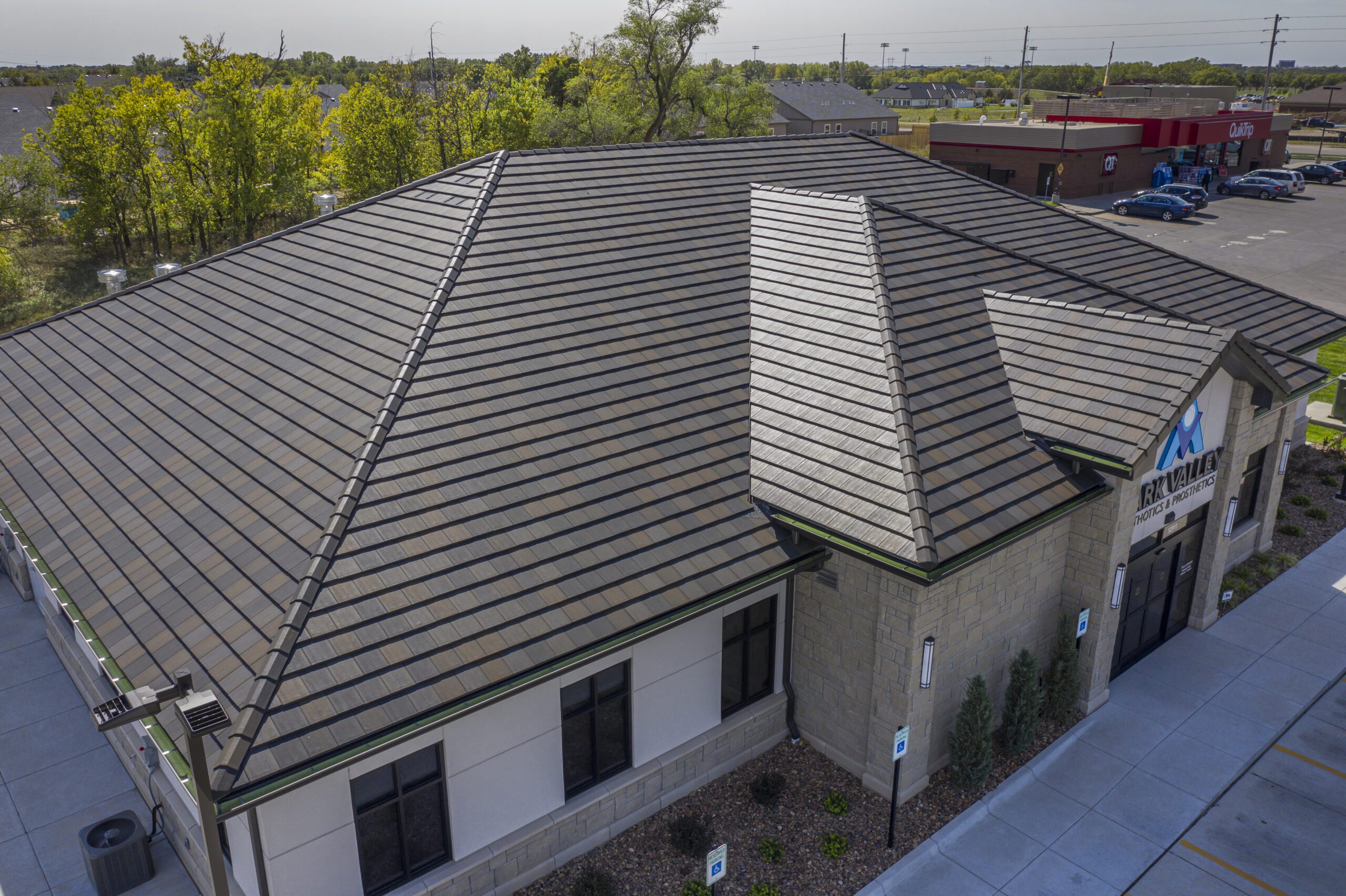 A concrete tile roof installed on a new construction building.