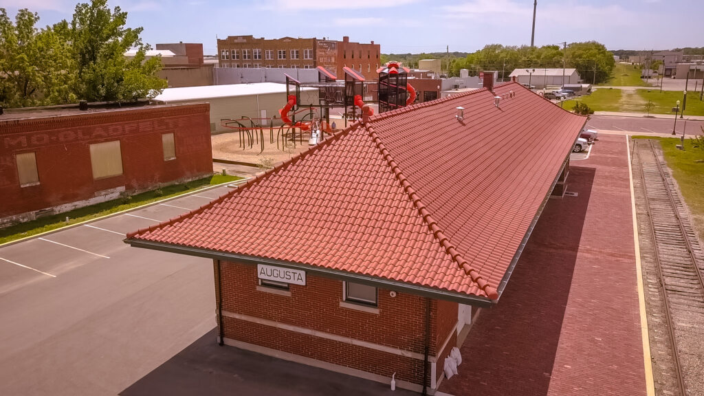 A historic train depot with a Ludowici clay tile roof that retained the building's original aesthetic.
