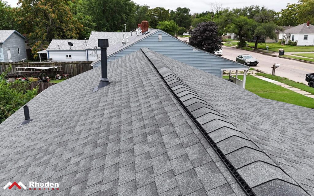 An example of a heater flue exceeding the height of any rooftop component within 10 feet by 2 feet.