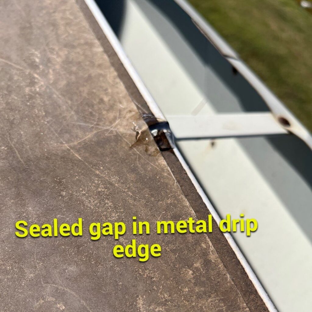 An annotated picture of sealant applied at a gap in a commercial low-slope roof's drip edge by commercial box gutters.