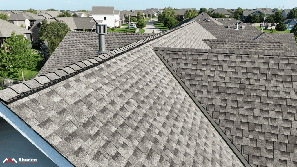 Continuous ridge vent installed on a gabled asphalt shingle roof.