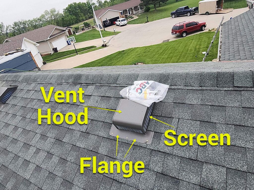 A new box vent installed on an asphalt shingle roof with sealant resting on top for the exposed fasteners on the flange.