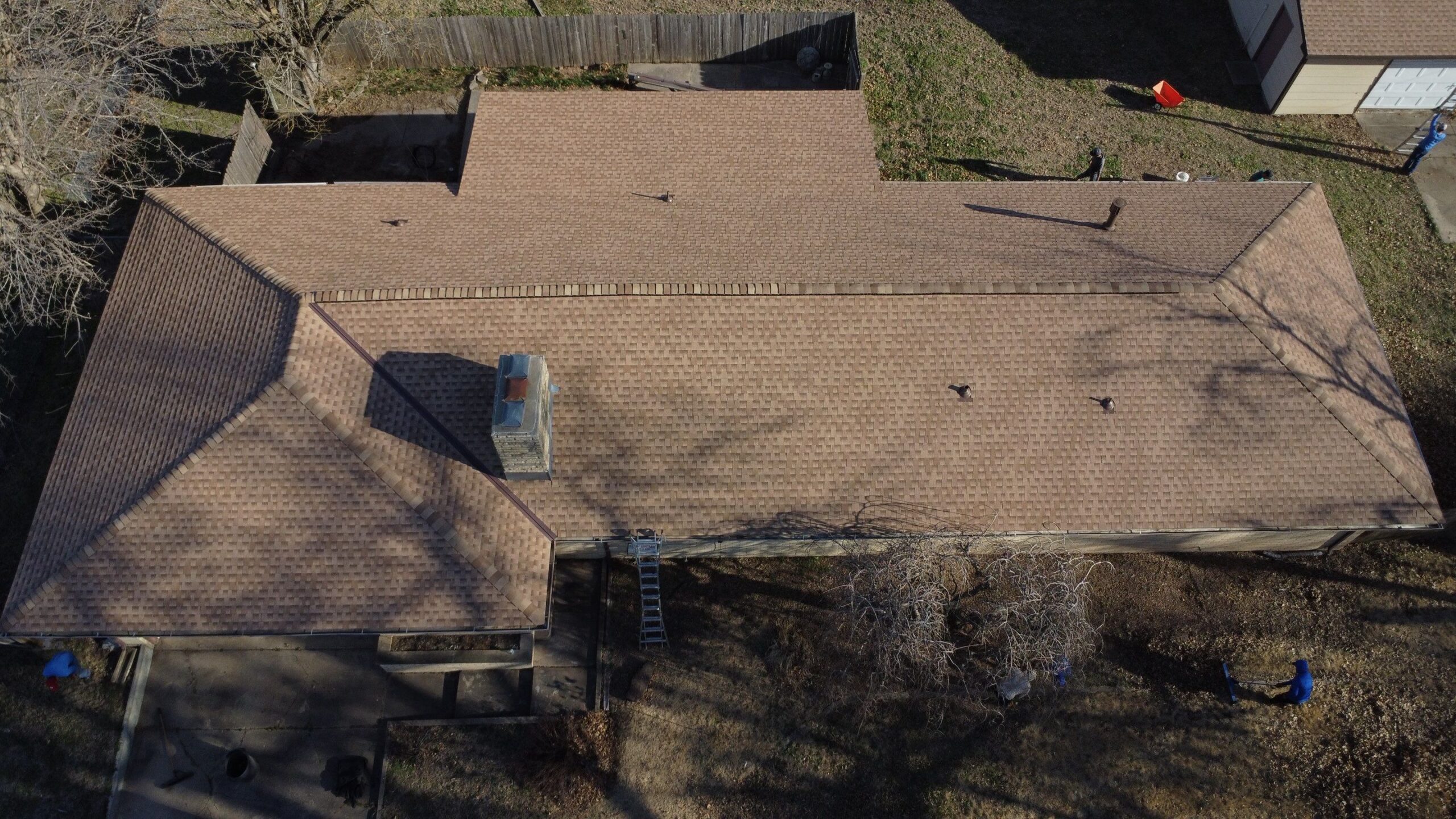 Simple architectural shingle roof with a 5:12 slope and full decking replacement